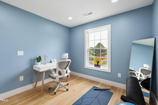 2004 Tennessee Rd, Durham, NC 27704 - home office featuring baseboards, recessed lighting, and wood finished floors