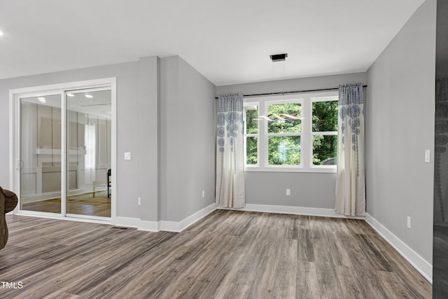 1003 E Sterlington Pl, Apex, NC 27502 - spare room with wood finished floors and baseboards