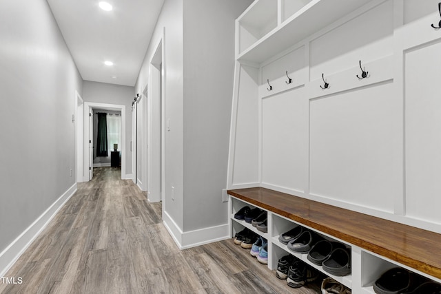 1003 E Sterlington Pl, Apex, NC 27502 - mudroom featuring wood finished floors, baseboards, and recessed lighting