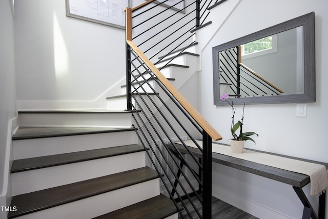 1003 E Sterlington Pl, Apex, NC 27502 - staircase with baseboards and wood finished floors