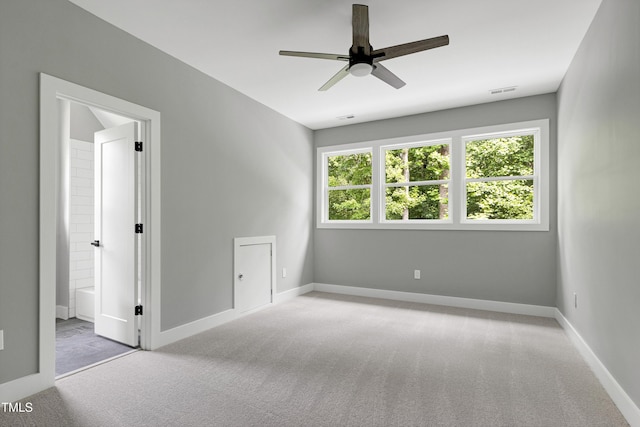 1003 E Sterlington Pl, Apex, NC 27502 - carpeted spare room with a ceiling fan and baseboards