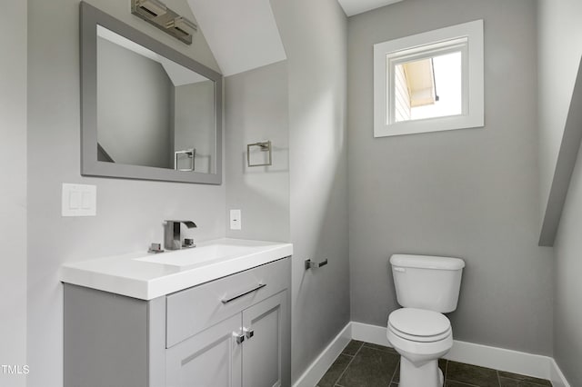 1003 E Sterlington Pl, Apex, NC 27502 - bathroom featuring toilet, vanity, baseboards, and tile patterned flooring