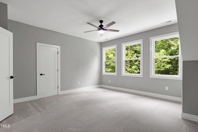 1003 E Sterlington Pl, Apex, NC 27502 - spare room featuring light carpet, baseboards, and ceiling fan