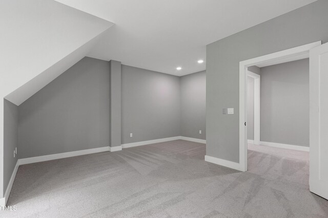 1003 E Sterlington Pl, Apex, NC 27502 - additional living space with carpet flooring, recessed lighting, baseboards, and lofted ceiling