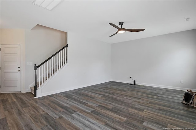 633 Amusement Dr, Hope Mills, NC 28348 - unfurnished living room with a ceiling fan, dark wood finished floors, stairs, and baseboards