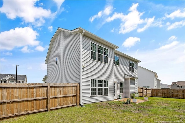 633 Amusement Dr, Hope Mills, NC 28348 - back of property with a patio