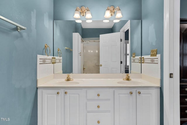 106 Irene Ct, Rocky Mount, NC 27804 - bathroom featuring a shower and double vanity