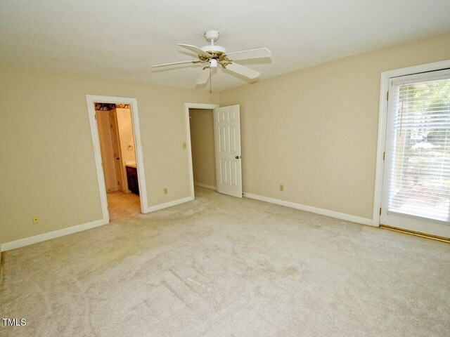 119 Long Shadow Ln, Cary, NC 27518 - unfurnished bedroom featuring carpet floors, baseboards, access to outside, a ceiling fan, and connected bathroom