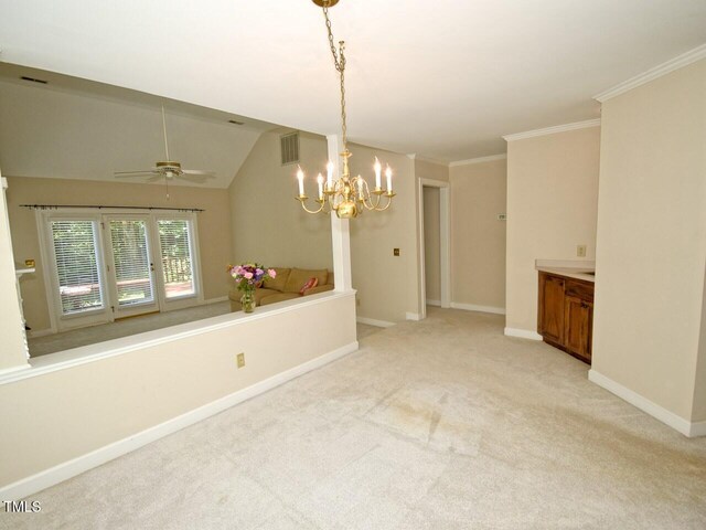 119 Long Shadow Ln, Cary, NC 27518 - unfurnished dining area featuring light colored carpet, a chandelier, a ceiling fan, baseboards, and crown molding