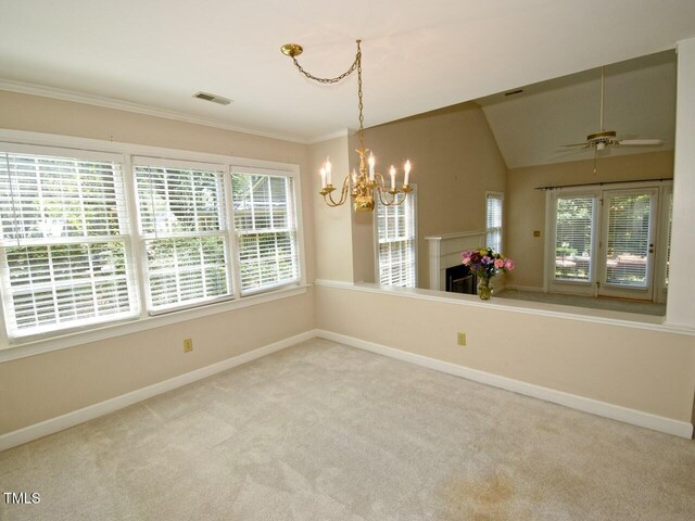 119 Long Shadow Ln, Cary, NC 27518 - unfurnished dining area with baseboards, carpet, a chandelier, crown molding, and a ceiling fan