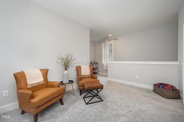 sitting room with carpet floors, baseboards, and recessed lighting