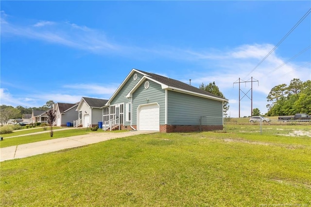2256 Spindletree Dr, Fayetteville, NC 28304 - view of side of property with a garage, driveway, and crawl space