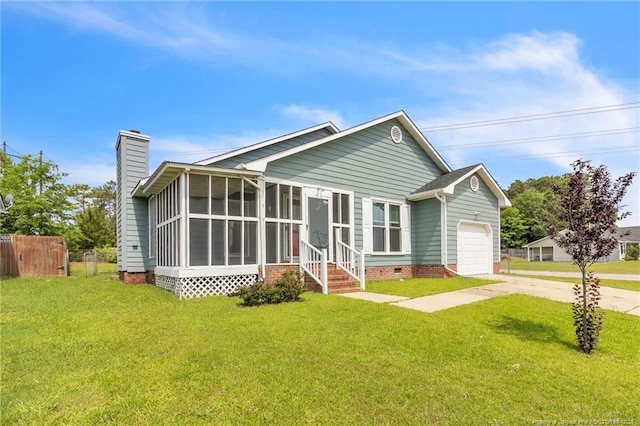 2256 Spindletree Dr, Fayetteville, NC 28304 - view of front of house featuring a garage, driveway, a sunroom, crawl space, and a chimney