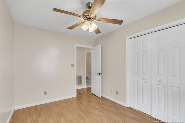2256 Spindletree Dr, Fayetteville, NC 28304 - unfurnished bedroom with light wood-style floors, baseboards, a closet, and ceiling fan