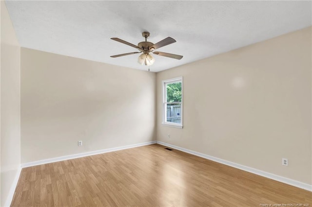 2256 Spindletree Dr, Fayetteville, NC 28304 - unfurnished room with light wood finished floors, baseboards, and a ceiling fan