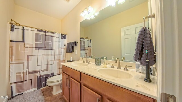 99 Grassy Creek Way, Chapel Hill, NC 27517 - bathroom with toilet, double vanity, tile patterned flooring, and shower / bathtub combination with curtain