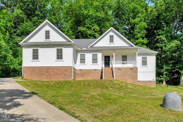 10304 Stallion Way, Bahama, NC 27503 - modern farmhouse featuring crawl space, a front yard, and covered porch