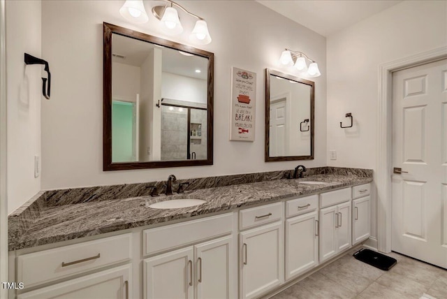 10304 Stallion Way, Bahama, NC 27503 - bathroom featuring double vanity and tiled shower
