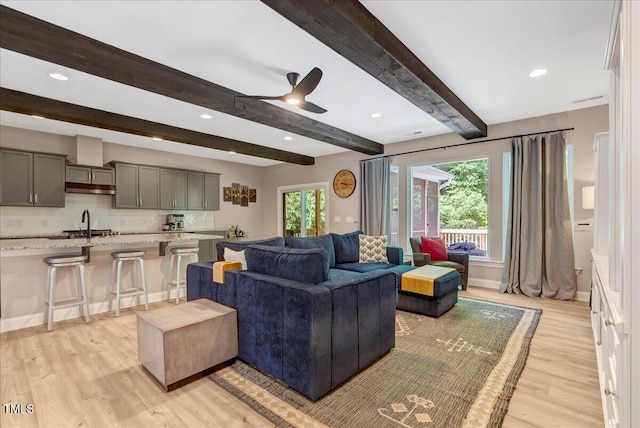 10304 Stallion Way, Bahama, NC 27503 - living area with light wood-type flooring, beam ceiling, a ceiling fan, baseboards, and recessed lighting