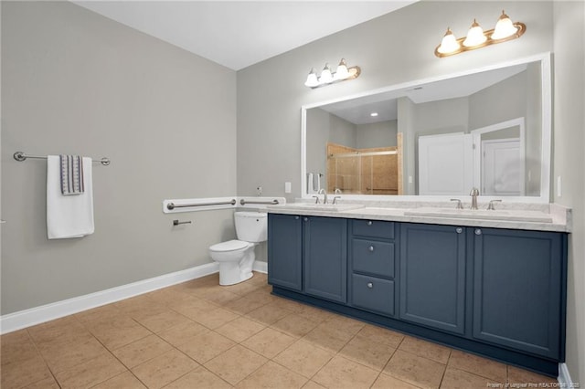 full bath featuring a stall shower, baseboards, tile patterned floors, and double vanity
