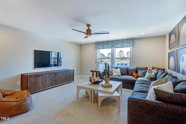 living room with carpet flooring, a ceiling fan, and recessed lighting