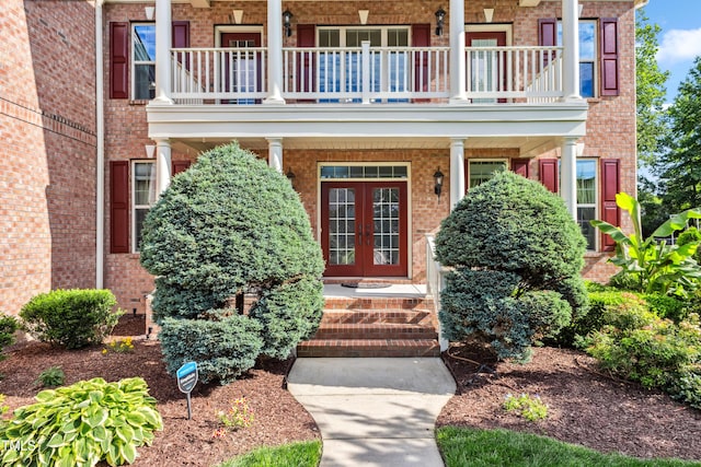 3404 Mount Pisgah Way, Cary, NC 27519 - entrance to property featuring a balcony, covered porch, brick siding, and french doors