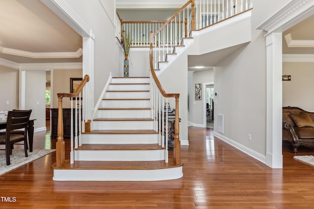 3404 Mount Pisgah Way, Cary, NC 27519 - stairway with wood finished floors, baseboards, and ornamental molding