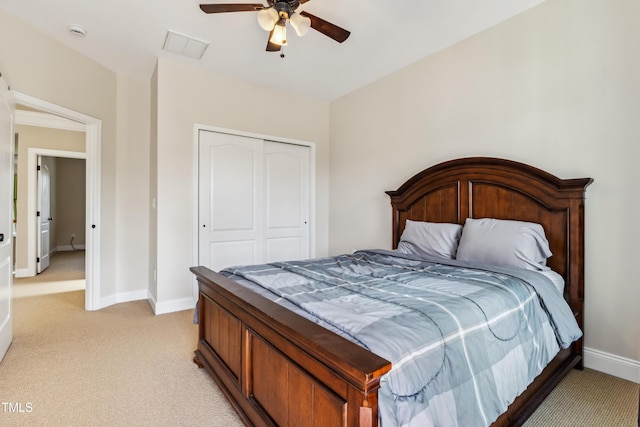 3404 Mount Pisgah Way, Cary, NC 27519 - bedroom featuring light carpet, a closet, baseboards, and a ceiling fan