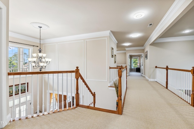 3404 Mount Pisgah Way, Cary, NC 27519 - hallway featuring a chandelier, an upstairs landing, carpet flooring, ornamental molding, and baseboards