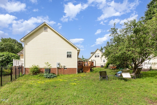 view of home's exterior featuring a deck and crawl space