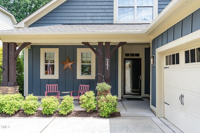 241 Serenity Hill Cir, Chapel Hill, NC 27516 - view of exterior entry featuring board and batten siding, a porch, and roof with shingles