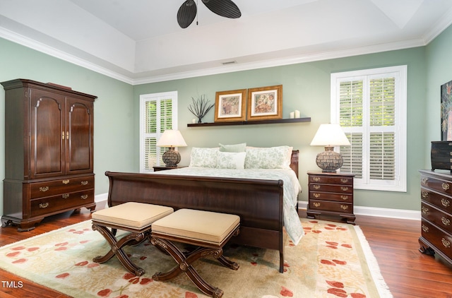 241 Serenity Hill Cir, Chapel Hill, NC 27516 - bedroom featuring wood finished floors, multiple windows, a raised ceiling, baseboards, and ornamental molding