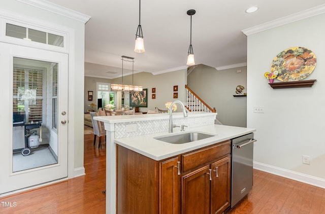 241 Serenity Hill Cir, Chapel Hill, NC 27516 - kitchen with a sink, light wood-style flooring, dishwasher, light countertops, and crown molding