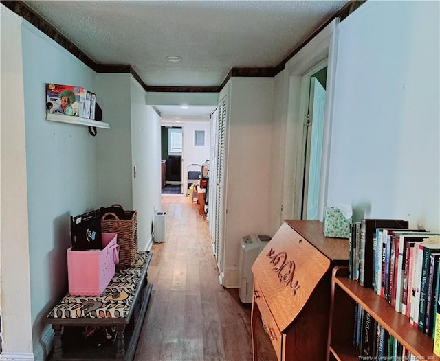 616 N Fulton St, Raeford, NC 28376 - corridor featuring crown molding and wood finished floors