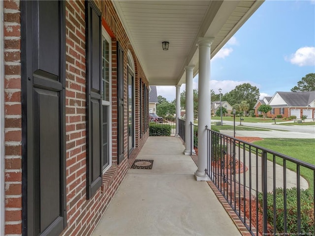 2815 Prioress Dr, Fayetteville, NC 28306 - view of patio / terrace with covered porch and a residential view