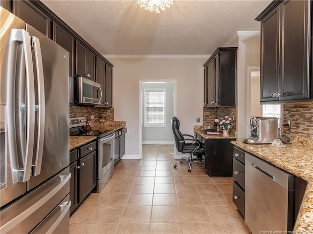 2815 Prioress Dr, Fayetteville, NC 28306 - kitchen with appliances with stainless steel finishes, ornamental molding, decorative backsplash, baseboards, and light stone countertops