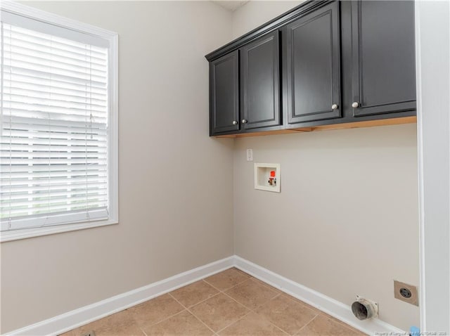 2815 Prioress Dr, Fayetteville, NC 28306 - clothes washing area featuring washer hookup, baseboards, cabinet space, electric dryer hookup, and light tile patterned floors