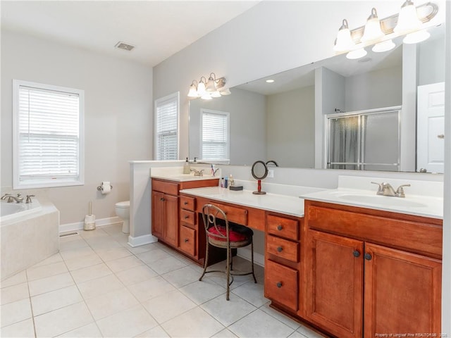 2815 Prioress Dr, Fayetteville, NC 28306 - bathroom with tile patterned flooring, double vanity, a stall shower, toilet, and a garden tub