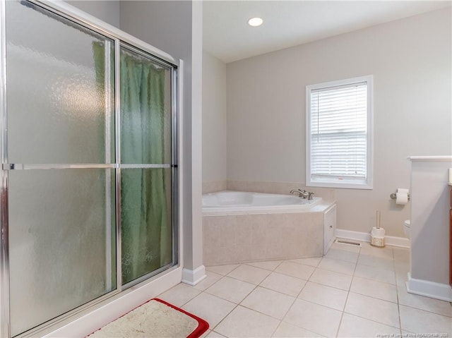 2815 Prioress Dr, Fayetteville, NC 28306 - bathroom featuring tile patterned floors, a bath, a shower stall, toilet, and recessed lighting