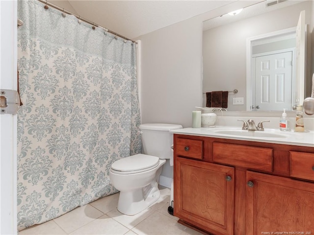 2815 Prioress Dr, Fayetteville, NC 28306 - bathroom featuring tile patterned floors, toilet, vanity, and curtained shower
