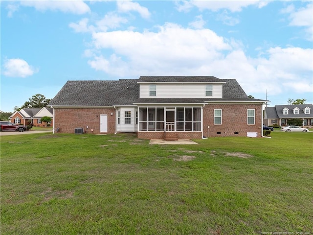 2815 Prioress Dr, Fayetteville, NC 28306 - rear view of house featuring a sunroom, a lawn, brick siding, crawl space, and a shingled roof