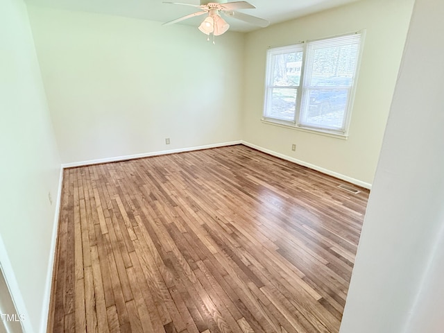 174 Carolina Dr, Reidsville, NC 27320 - unfurnished room with hardwood / wood-style flooring, baseboards, and ceiling fan