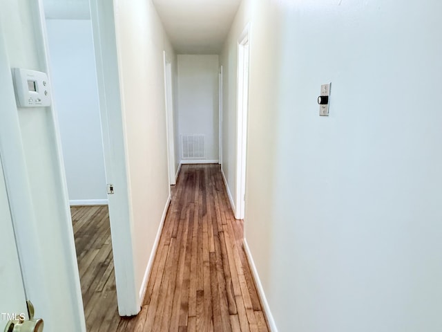 174 Carolina Dr, Reidsville, NC 27320 - hall with light wood-style floors and baseboards