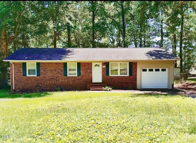 174 Carolina Dr, Reidsville, NC 27320 - ranch-style home featuring an attached garage, brick siding, a front lawn, and entry steps