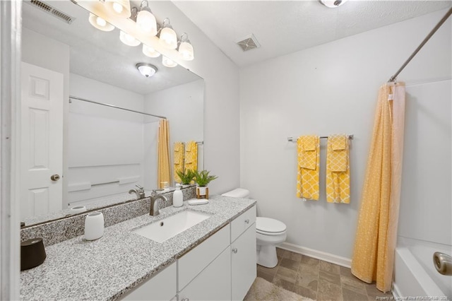 full bath with toilet, vanity, and baseboards