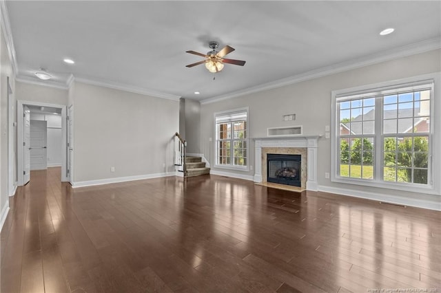 unfurnished living room with a ceiling fan, stairs, baseboards, wood finished floors, and recessed lighting
