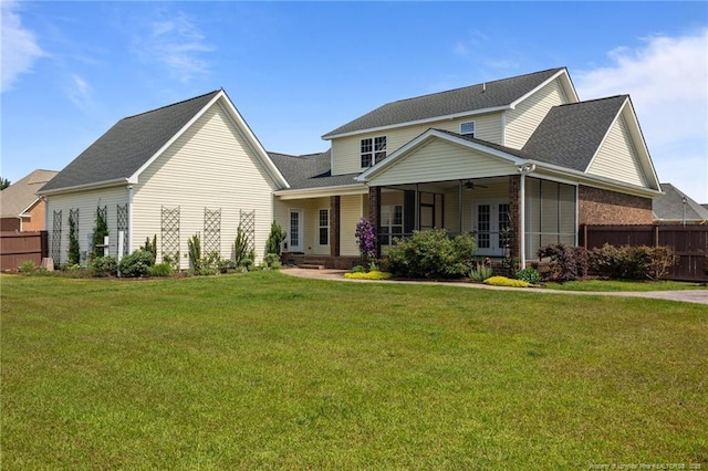 view of front facade featuring a ceiling fan, french doors, roof with shingles, and covered porch