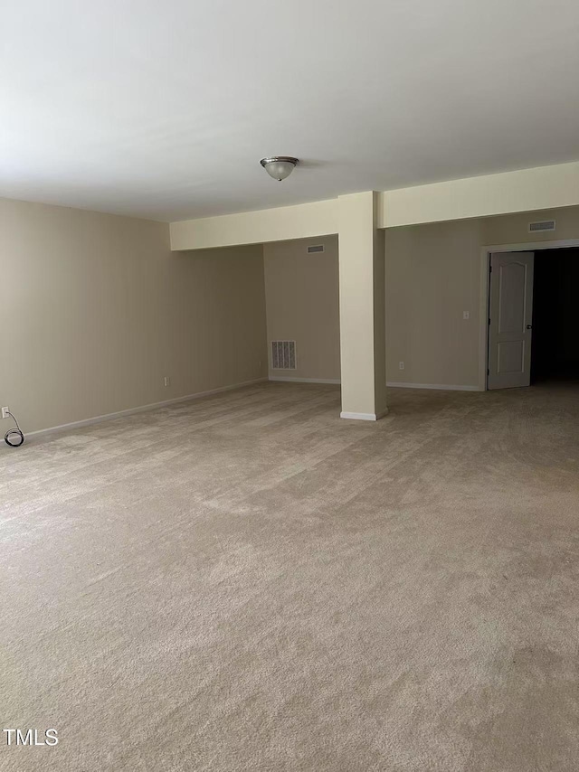 5804 Claribel Ct, Raleigh, NC 27612 - finished basement featuring light carpet and baseboards