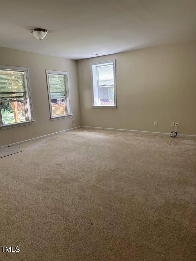 5804 Claribel Ct, Raleigh, NC 27612 - spare room with carpet floors and baseboards