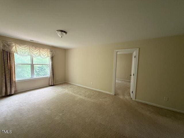 5804 Claribel Ct, Raleigh, NC 27612 - unfurnished room featuring carpet floors and baseboards